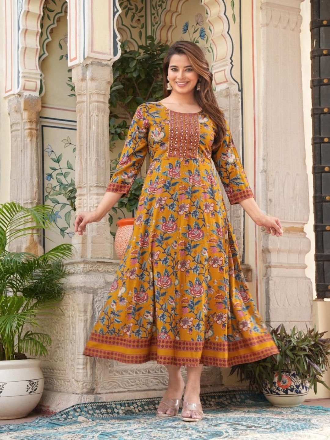 

KALINI Floral Printed Empire Mirror Work Round Neck A-Line Kurta, Mustard