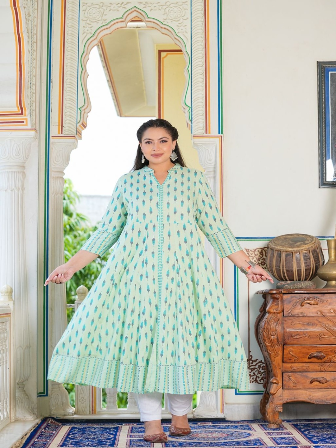 

KALINI Geometric Ikat Printed Mandarin Collar Panelled Anarkali Kurta, Green