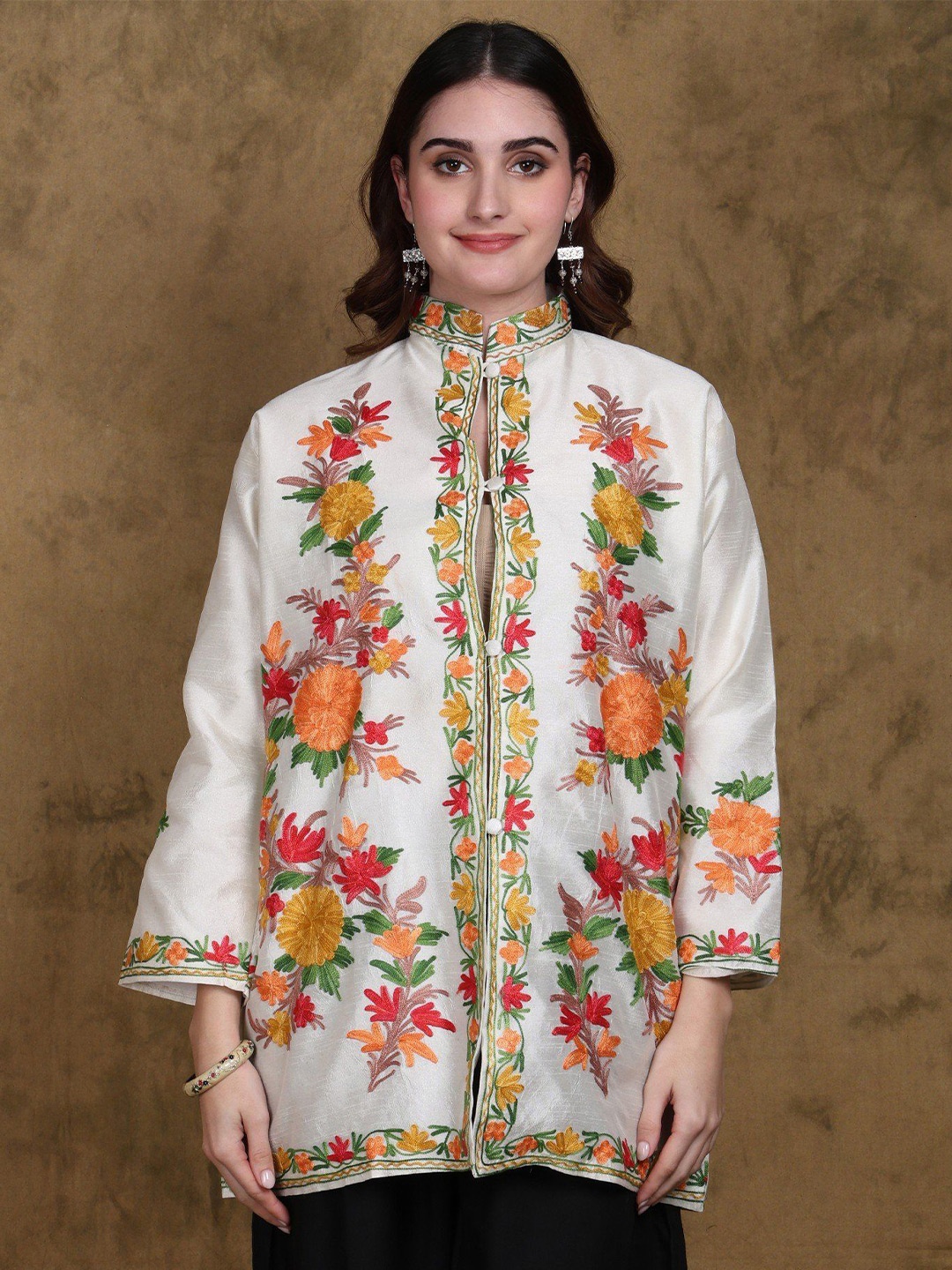 

Exotic India White Mandarin Collar Art Silk Short Jacket with Aari-Embroidered Flowers