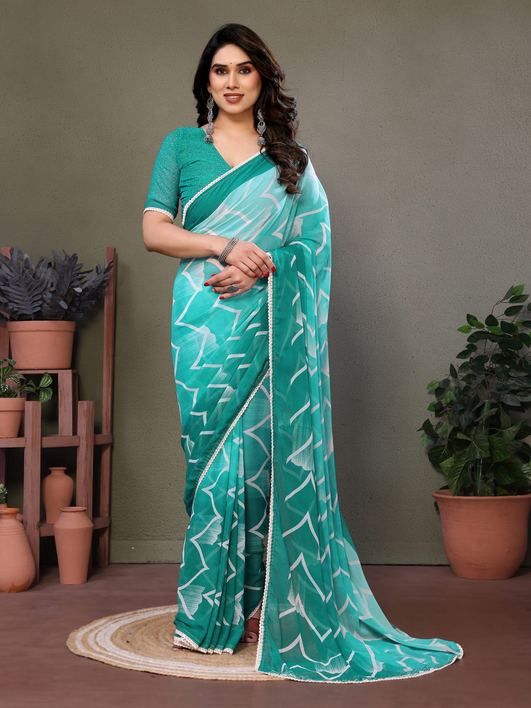 

VILLAGIUS Women Pure Georgette Block Print Saree, Turquoise blue