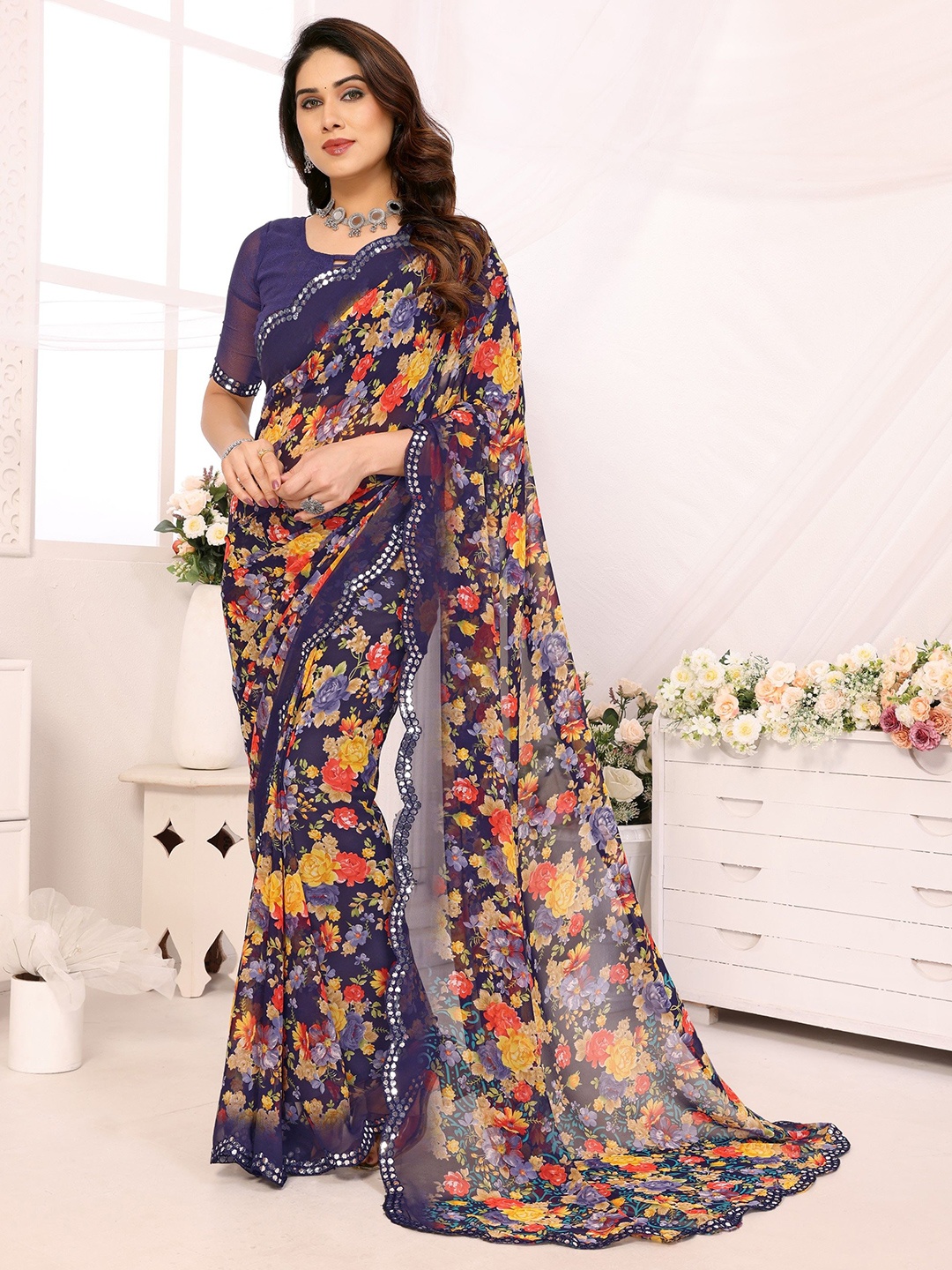 

Ambuja International Floral Printed Mirror Work Pure Georgette Saree, Navy blue