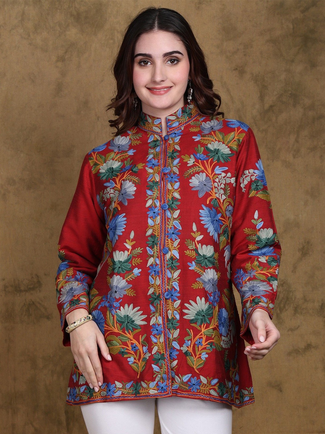 

Exotic India Jester Red Mandarin Collar Short Jacket with All Over Floral Aari Embroidered