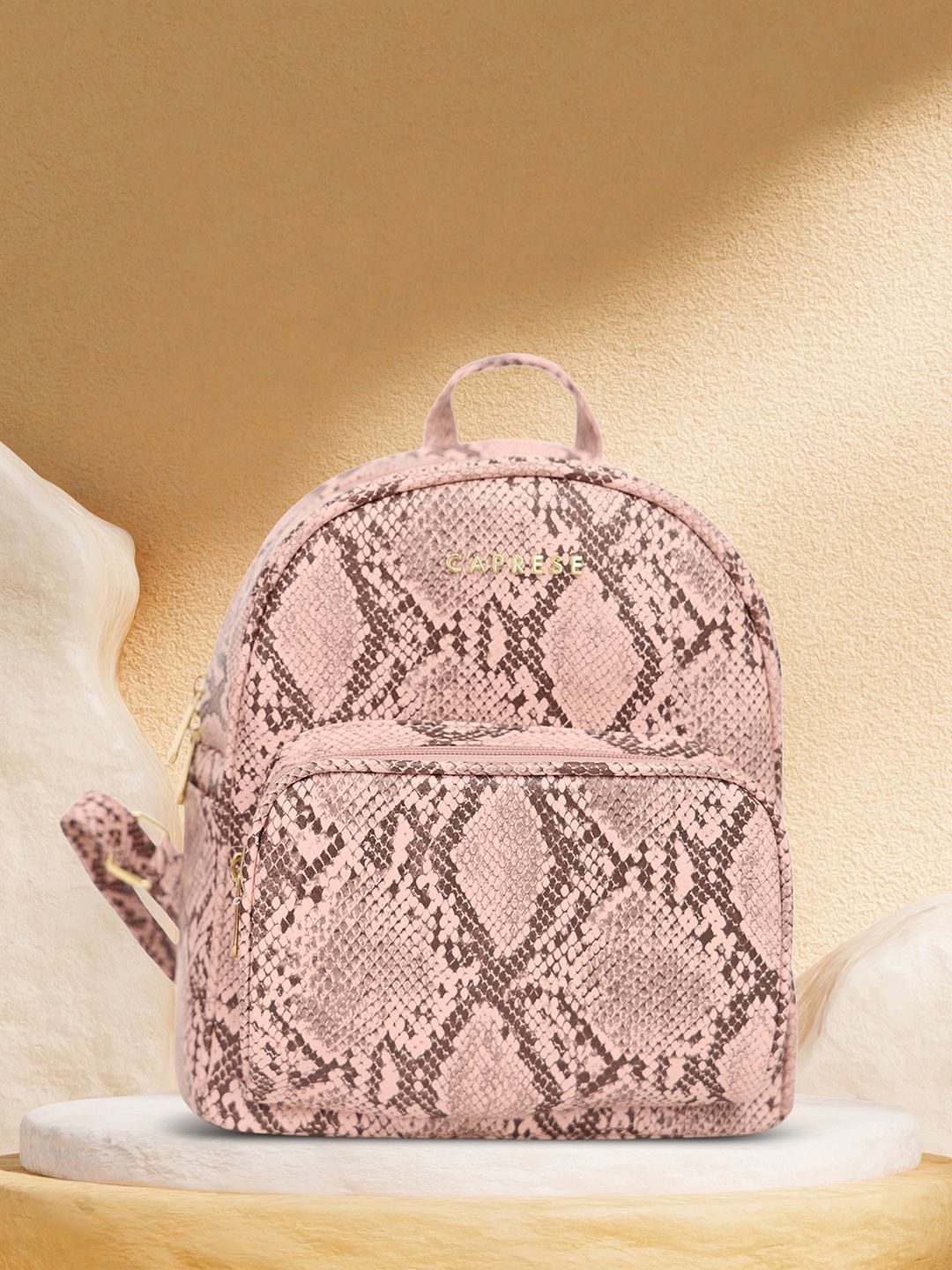 

Caprese Women Draco Fashion Textured Backpack, Pink