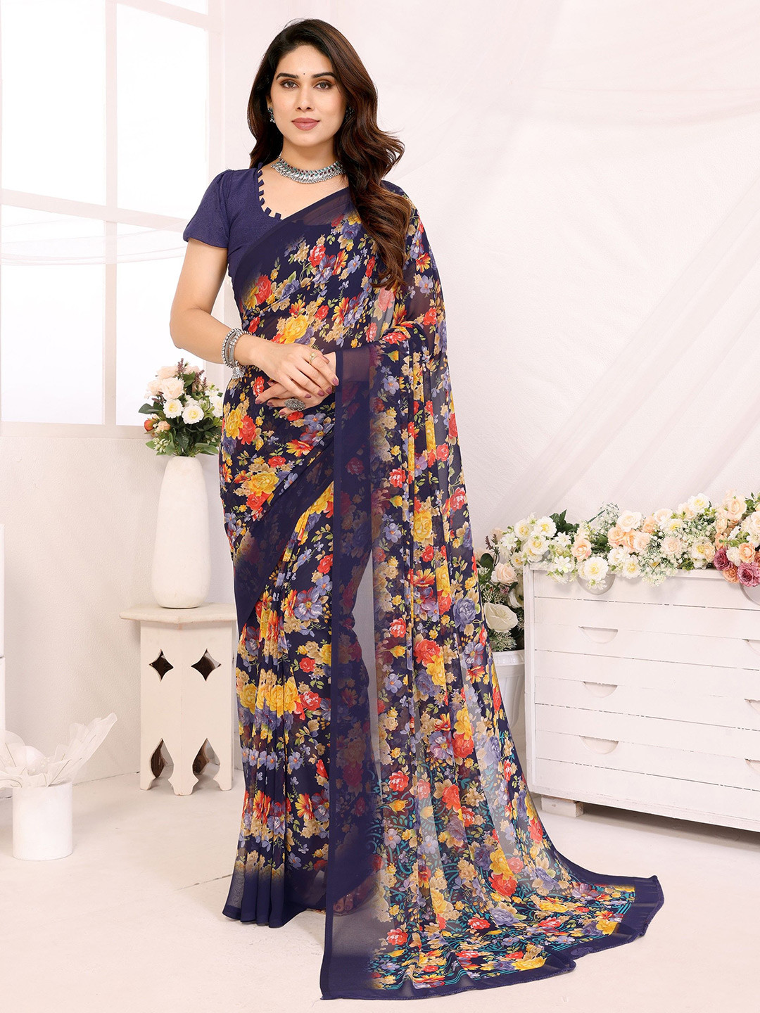 

Ambuja International Floral Pure Georgette Saree, Navy blue