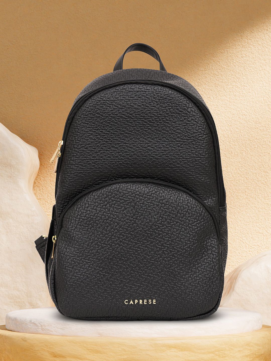 

Caprese Women Brand Logo Printed Backpack, Black