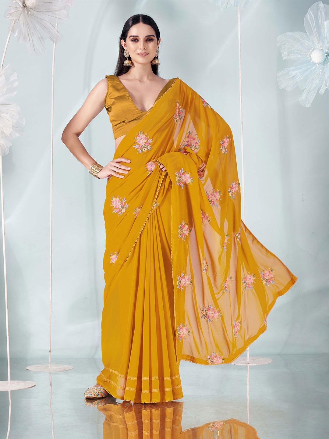 

Tikhi Imli Women Floral Embroidered Saree, Yellow