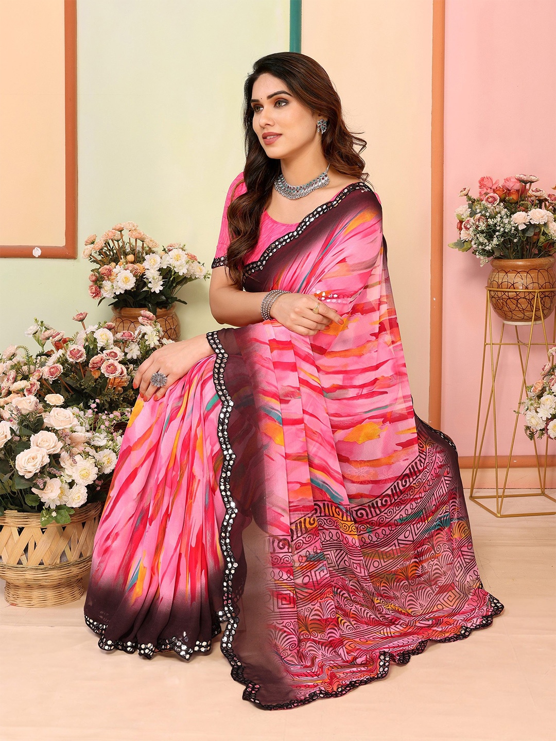 

Ambuja International Printed Mirror Work Pure Georgette Saree, Pink