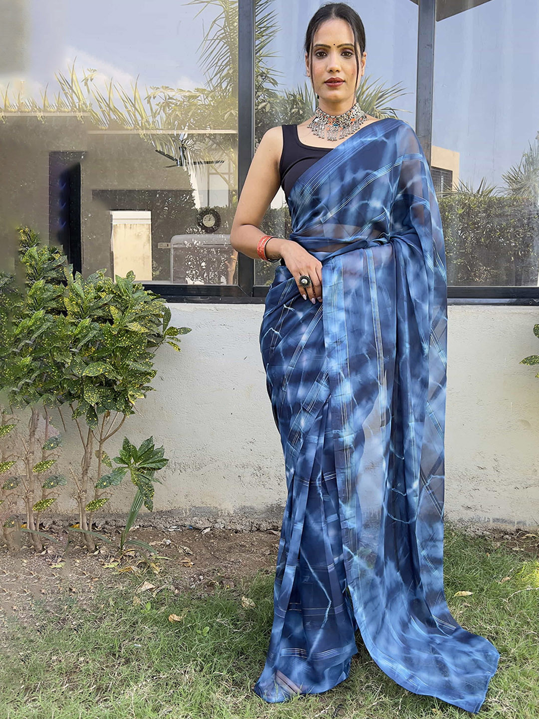 

DIVASTRI Women Blue Georgette tie-die leheriya ready to wear saree