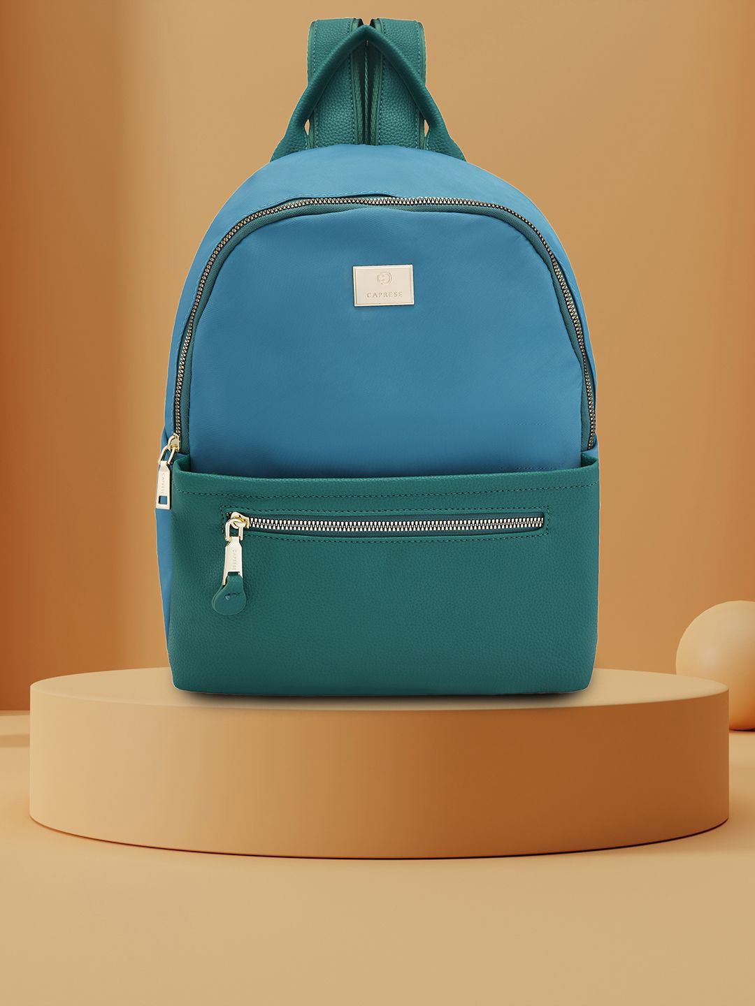 

Caprese Women Colourblocked Backpack, Blue