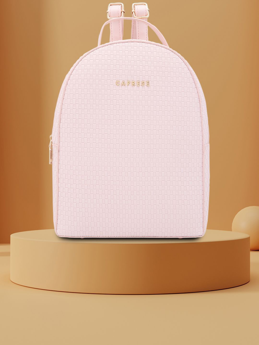 

Caprese Women Textured Backpack, Pink