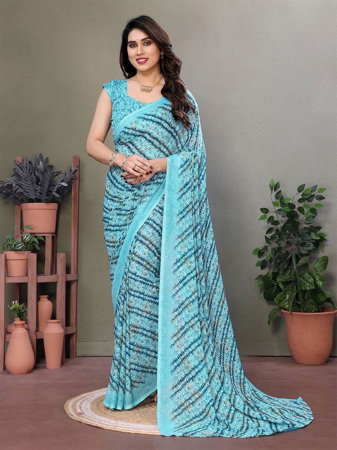 

Moda Rapido Abstract Printed Saree With Blouse Piece, Blue