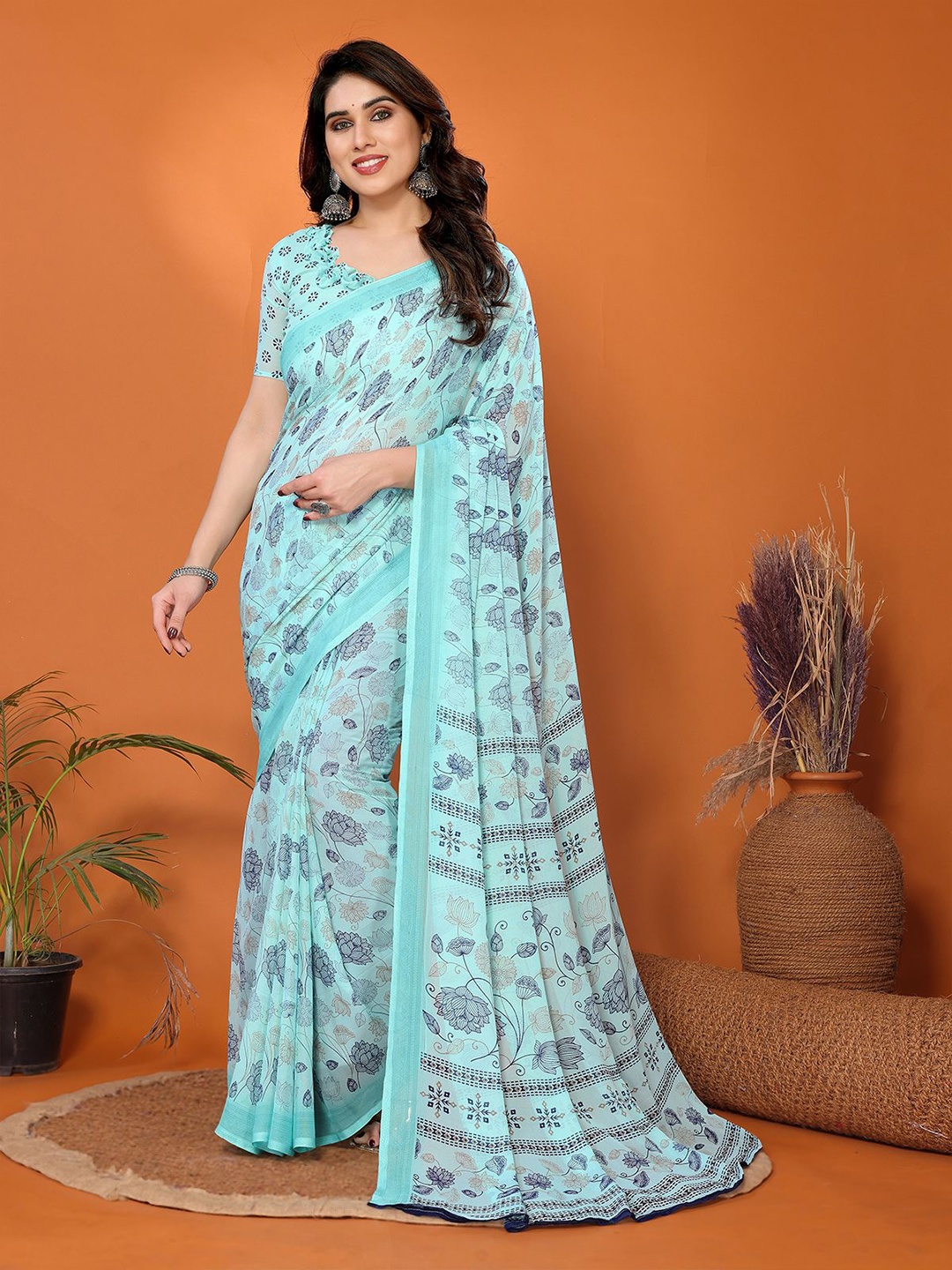 

Moda Rapido Floral Printed Saree, Blue