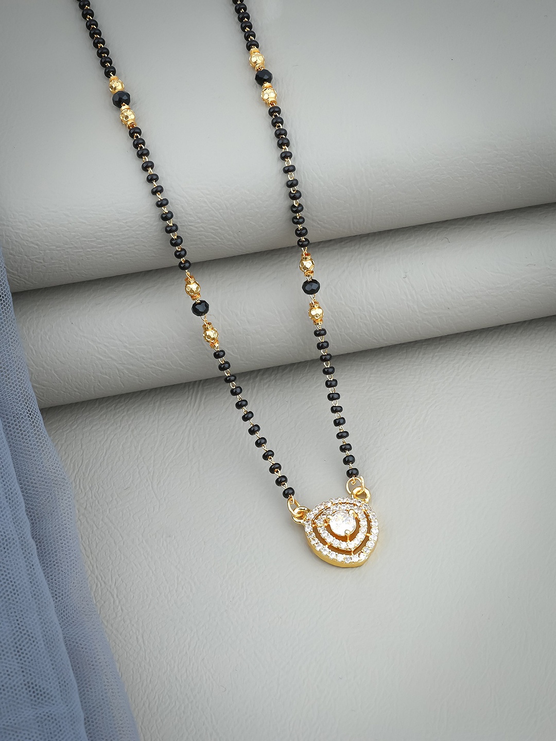 

Wynona Gold-Plated American Diamond Stone Studded & Beaded Mangalsutra