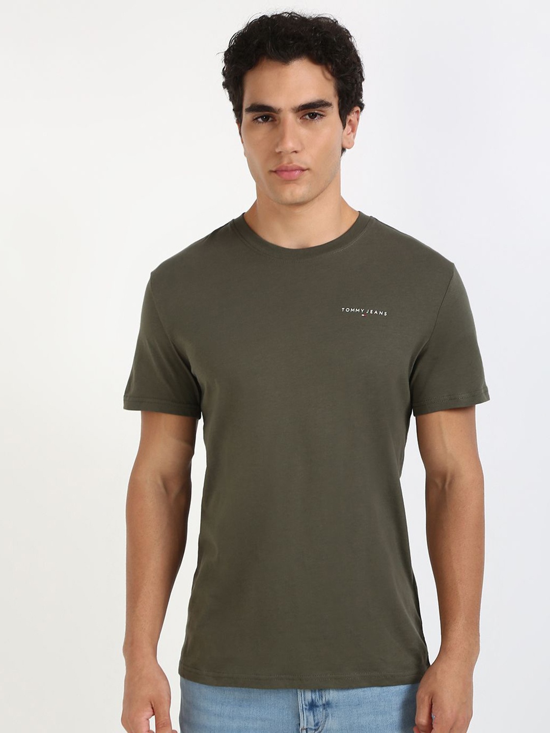 

Tommy Hilfiger Men Solid Round Neck Slim Fit Pure Cotton T-shirt, Olive