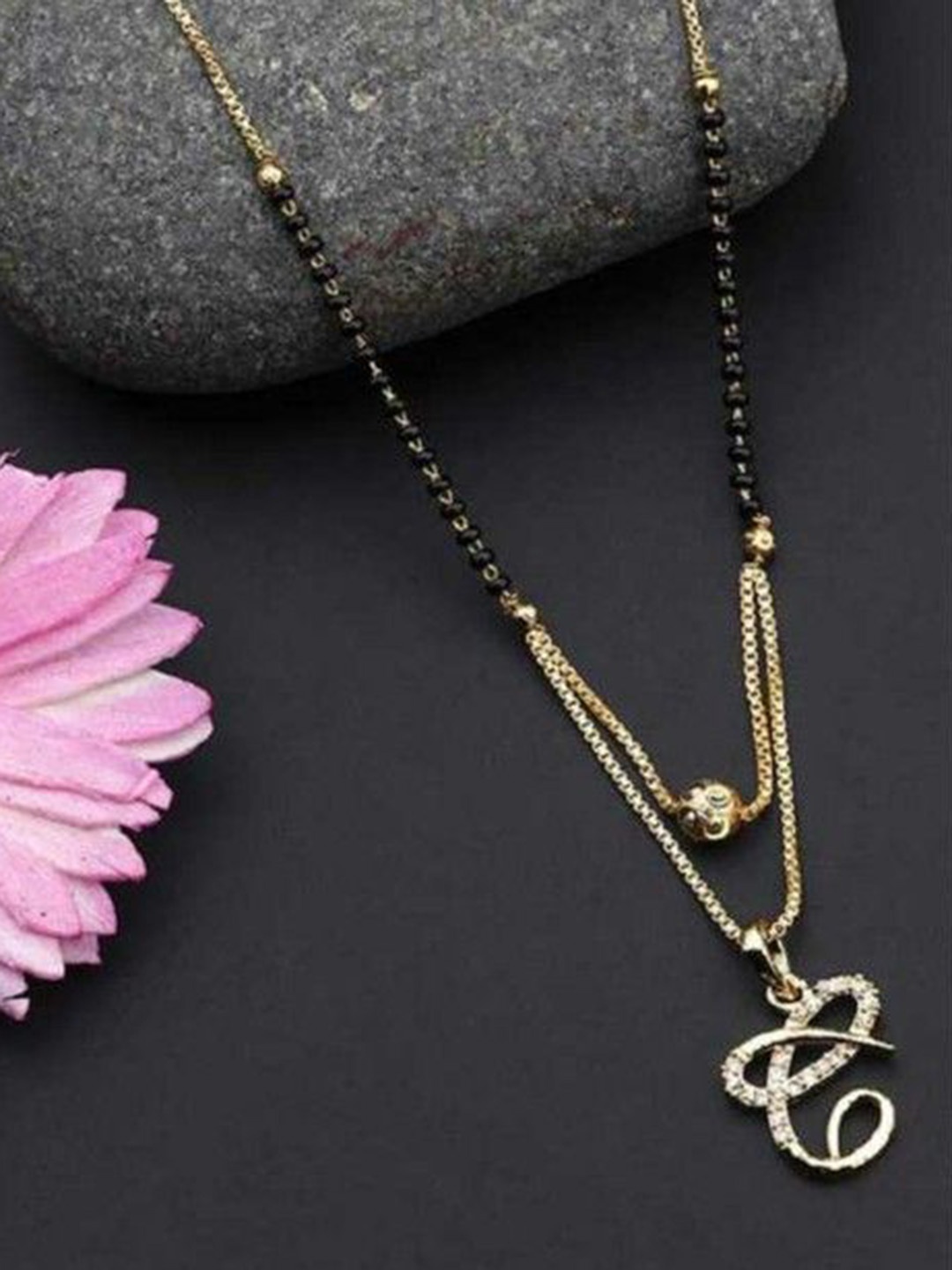

Wynona Gold Plated Stones Studded & Beaded Mangalsutra