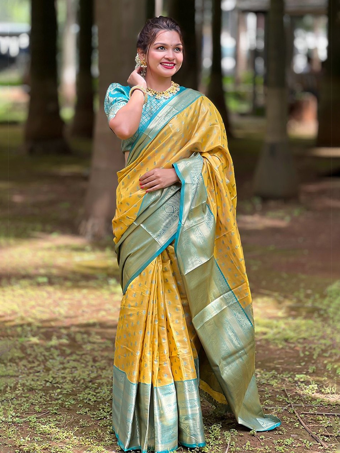 

Kalista Woven Design Zari Silk Blend Saree, Yellow