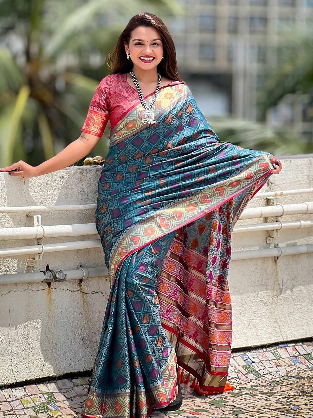 

Panzora Woven Design Zari Silk Blend Patola Saree, Teal