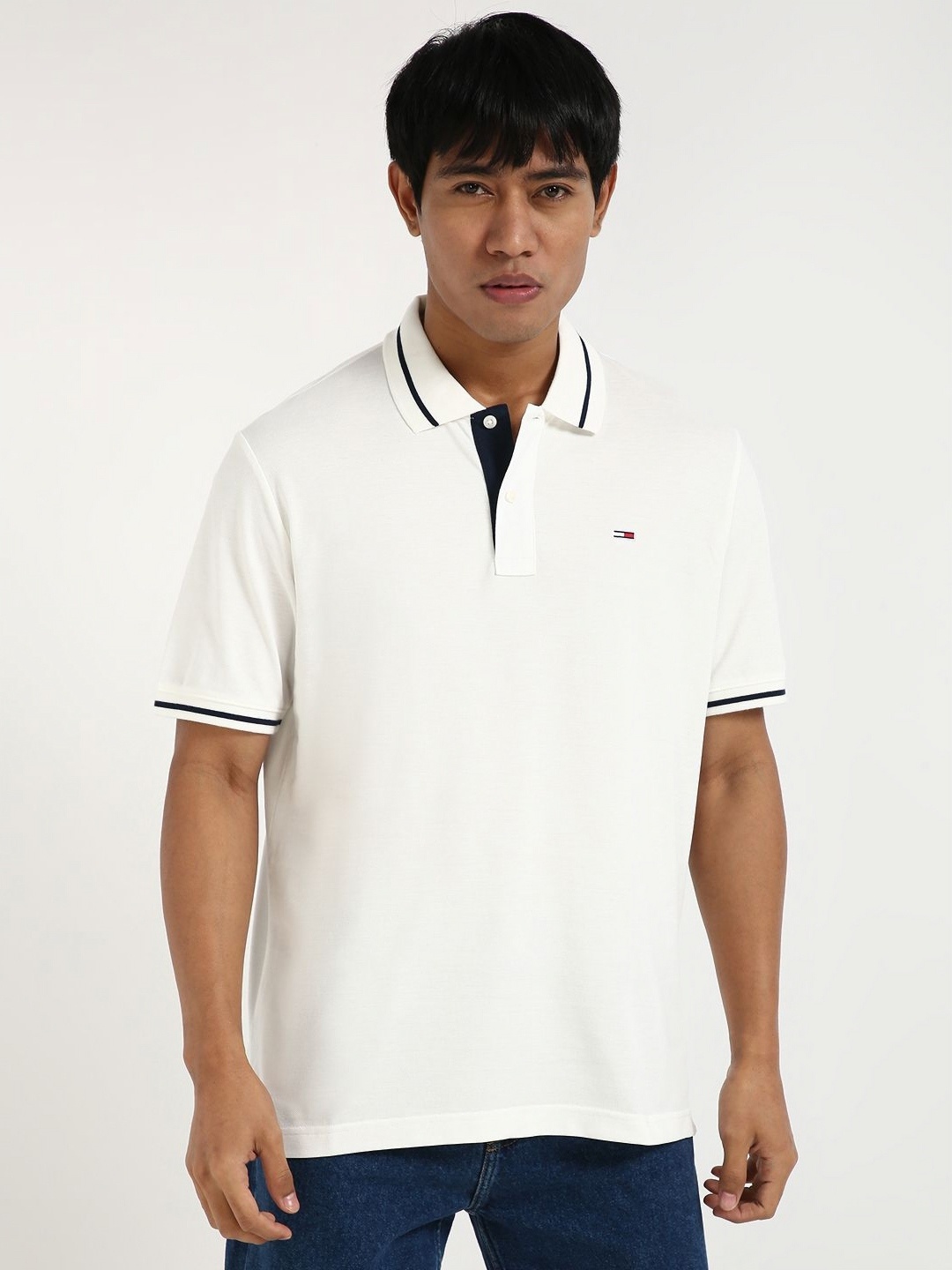 

Tommy Hilfiger Men Solid Polo Collar Pure Cotton T-shirt, White