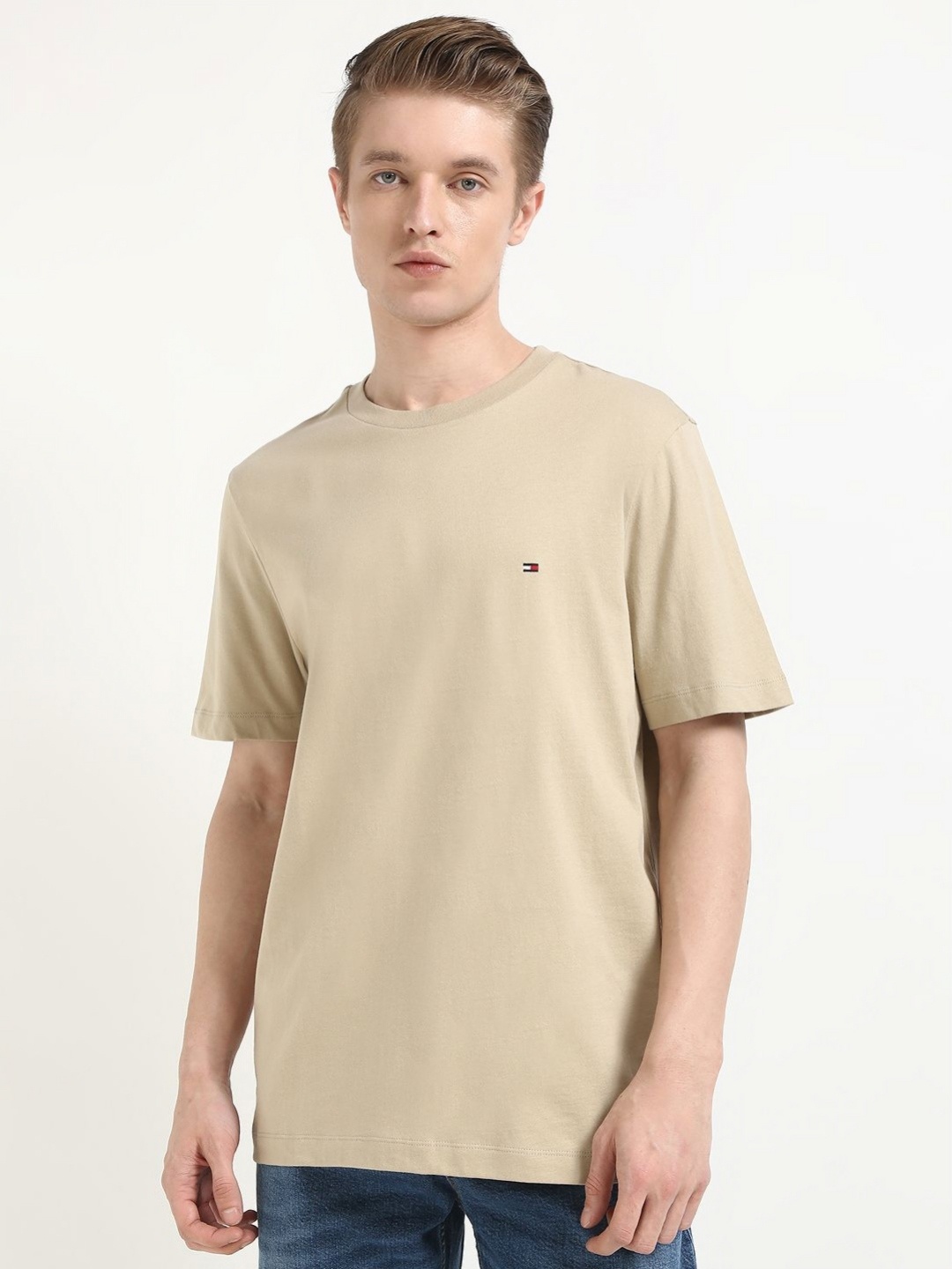 

Tommy Hilfiger Men Solid Round Neck Pure Cotton T-shirt, Beige