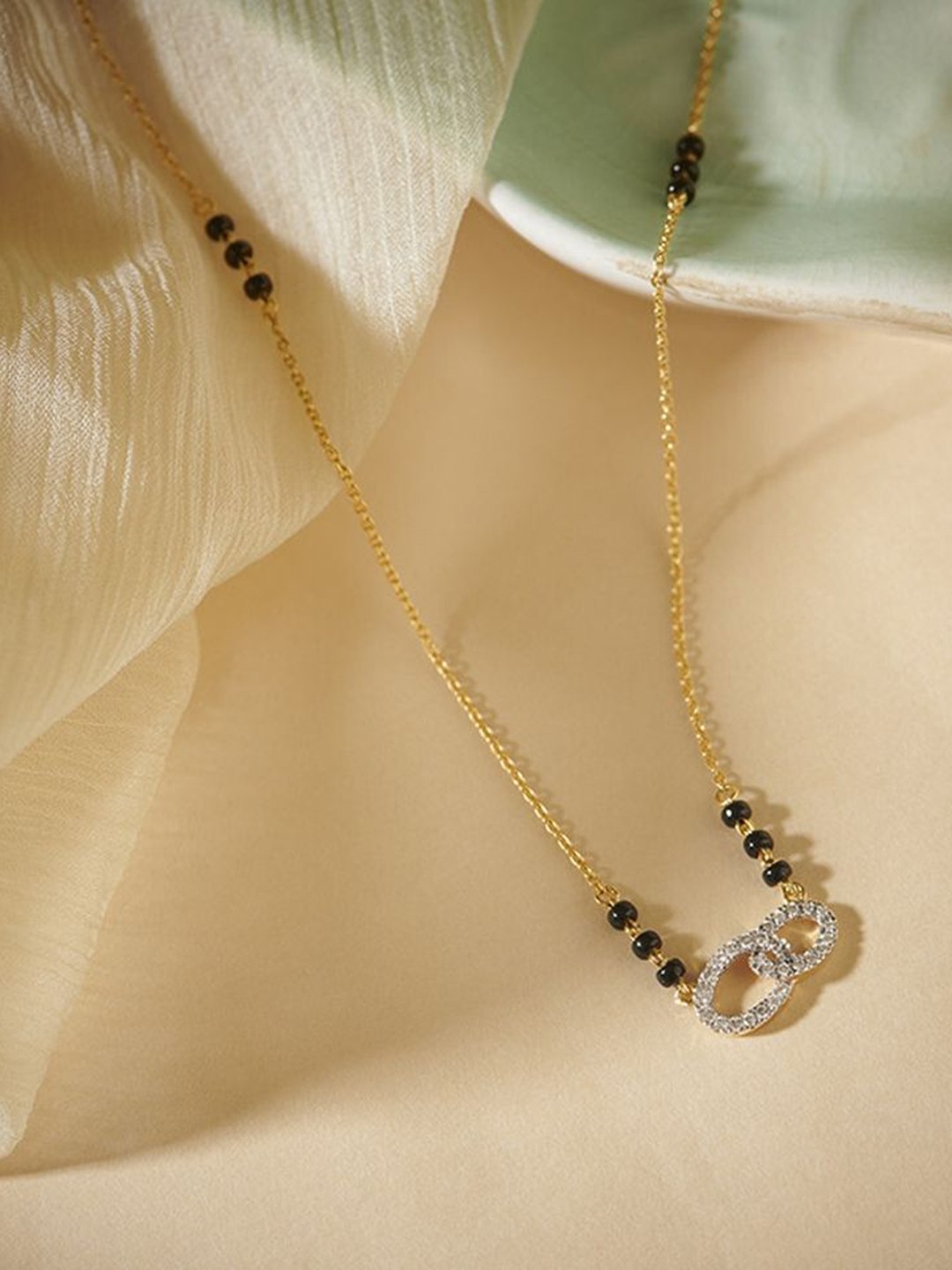 

Wynona Set Of 2 Gold-Plated Tanmaniya American Diamond & Beaded Mangalsutras