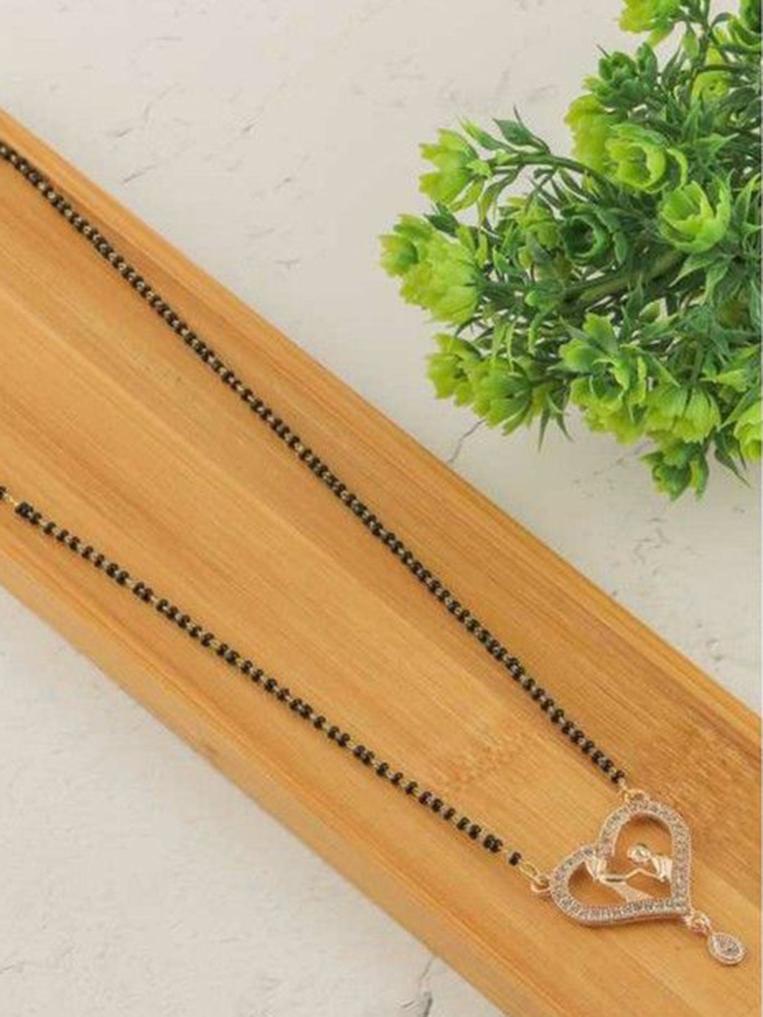 

Wynona Gold-Plated Stones Studded and Beaded Mangalsutra