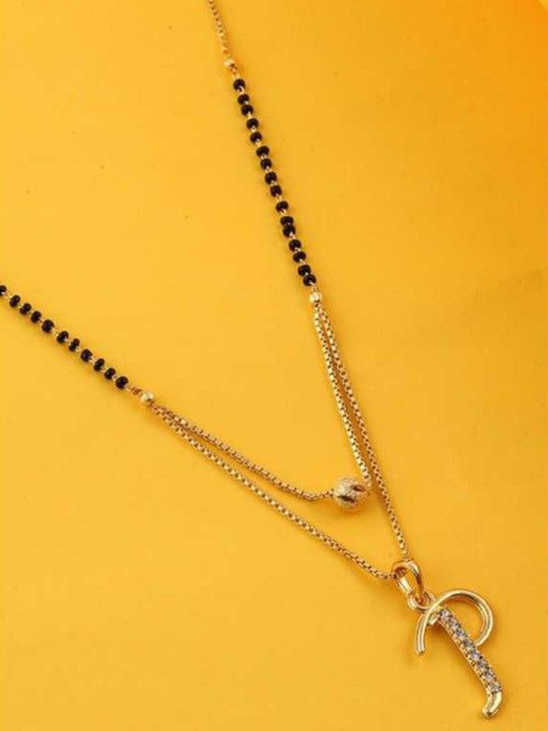 

Wynona Set Of 2 Gold Plated Artificial Stones And Beads Studded Mangalsutra