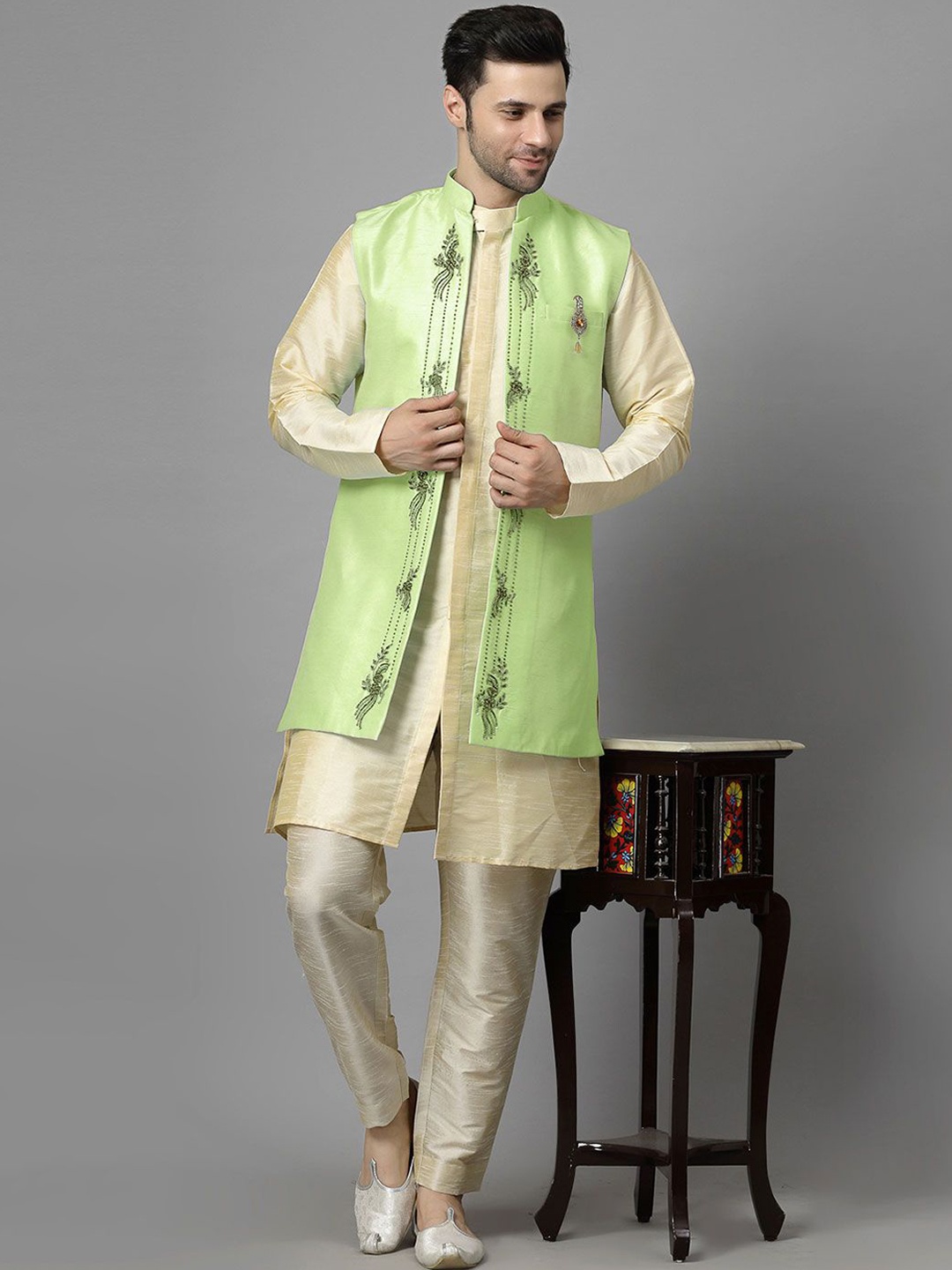 

Utsav Fashion Men Ethnic Motifs Embroidered High Slit Beads and Stones Kurta with Trousers, Beige