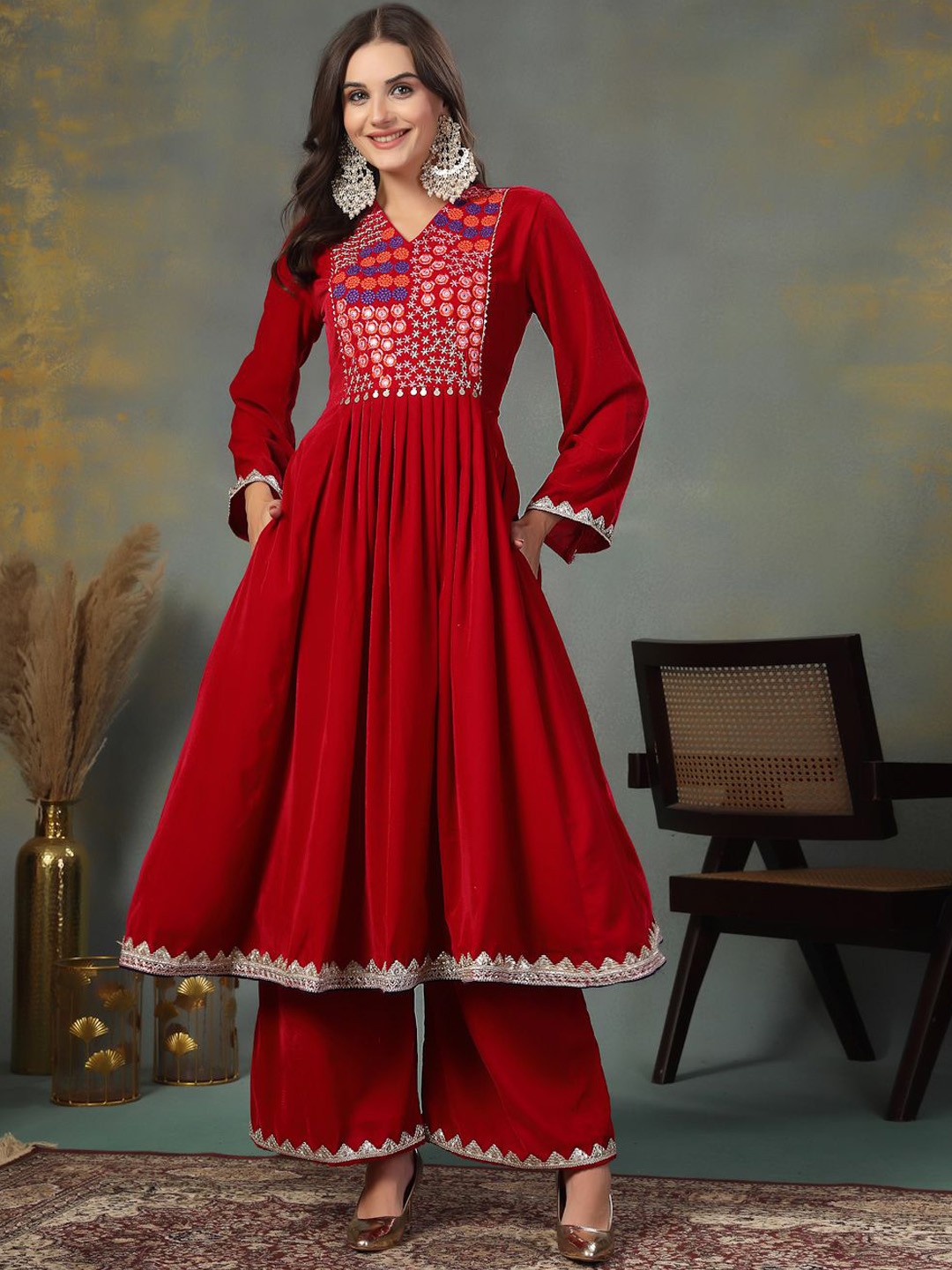 

Stylum Women Embroidered Empire Thread Work Velvet Kurta with Palazzos, Pink