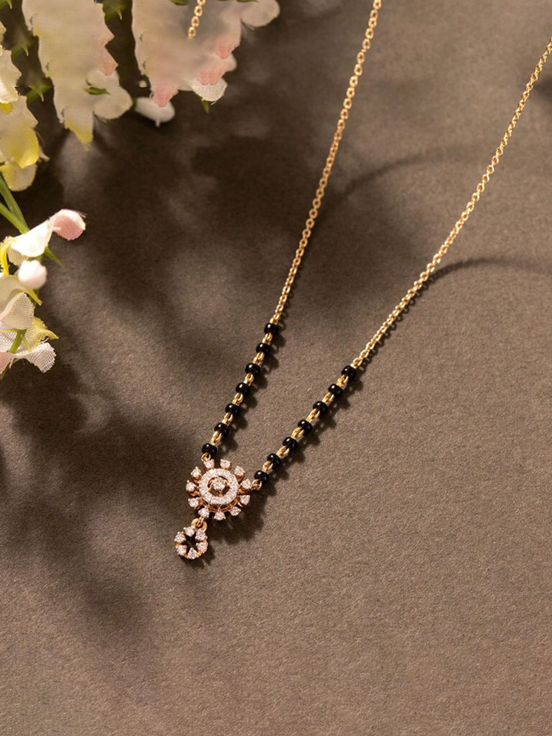 

Wynona Tanmaniya Pack Of 2 Gold-Plated Artificial Beads Mangalsutra