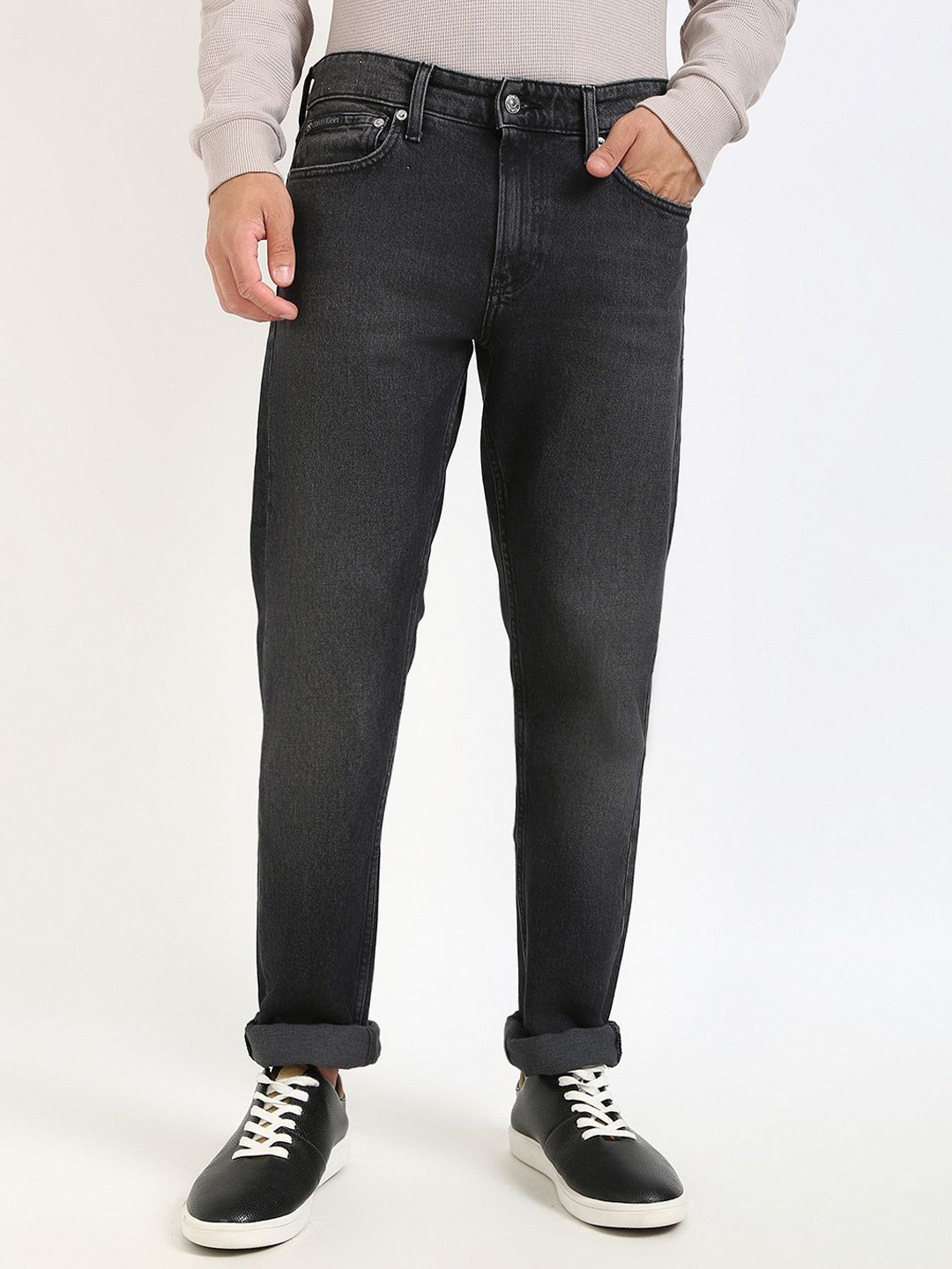 

Calvin Klein Jeans Men Slim Fit Mid-Rise Light Fade Cotton Jeans, Black