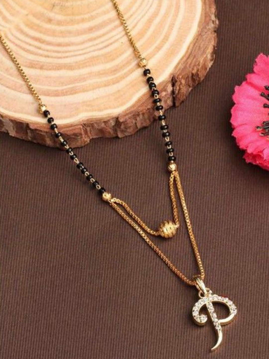 

Wynona Gold-Plated Stones Studded and Beaded Mangalsutra
