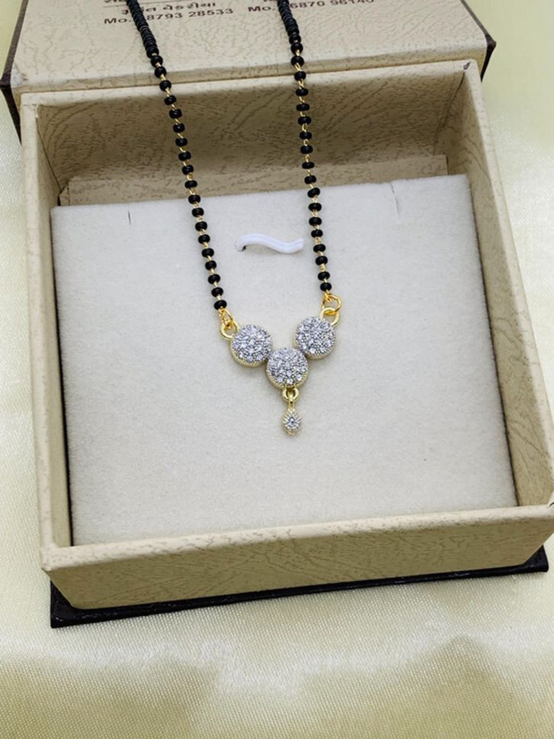 

Wynona Gold-Plated Stones Studded and Beaded Mangalsutra