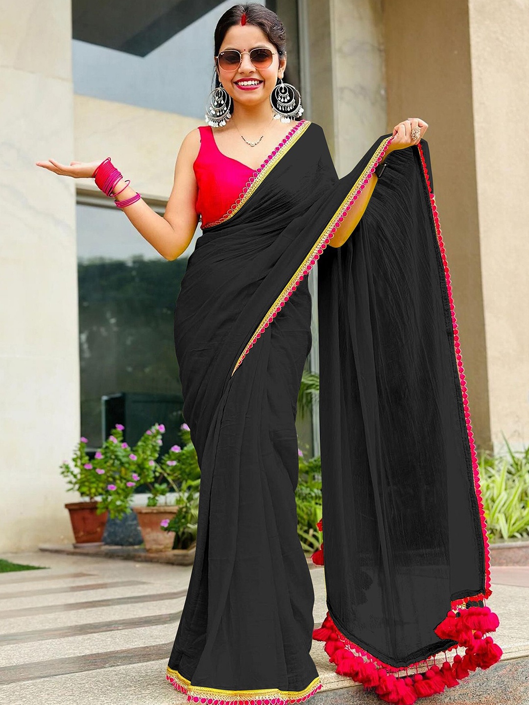 

APNISHA Embroidered Pure Georgette Saree, Black