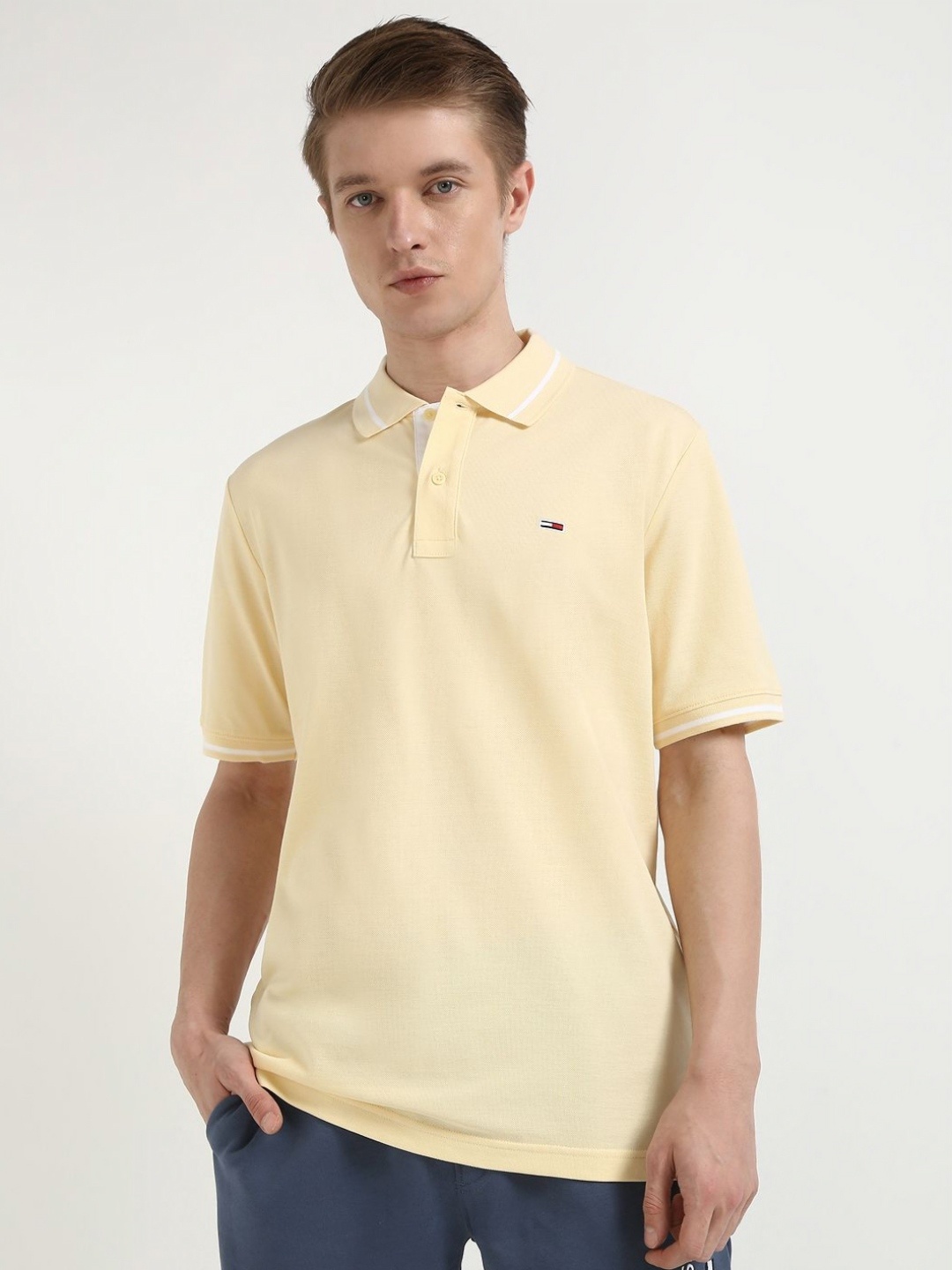 

Tommy Hilfiger Men Solid Polo Collar Pure Cotton T-shirt, Yellow