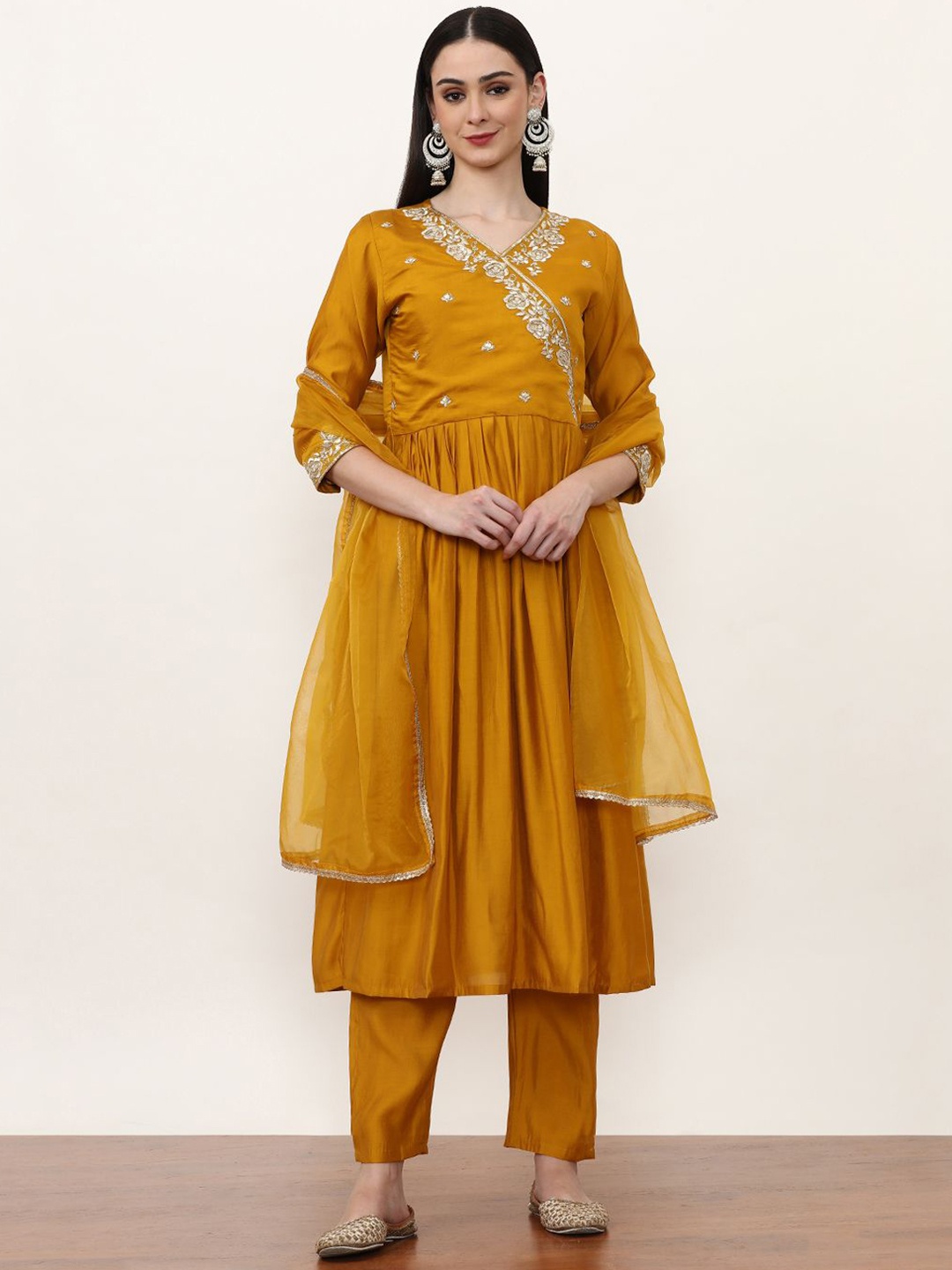 

Jaipur Kurti Women Ethnic Motifs Embroidered Angrakha Sequinned Chanderi Silk Kurta with Trousers & With, Mustard