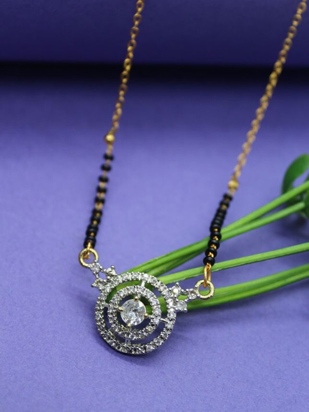 

Wynona Gold-Plated American Diamond Stone Studded & Beaded Mangalsutra