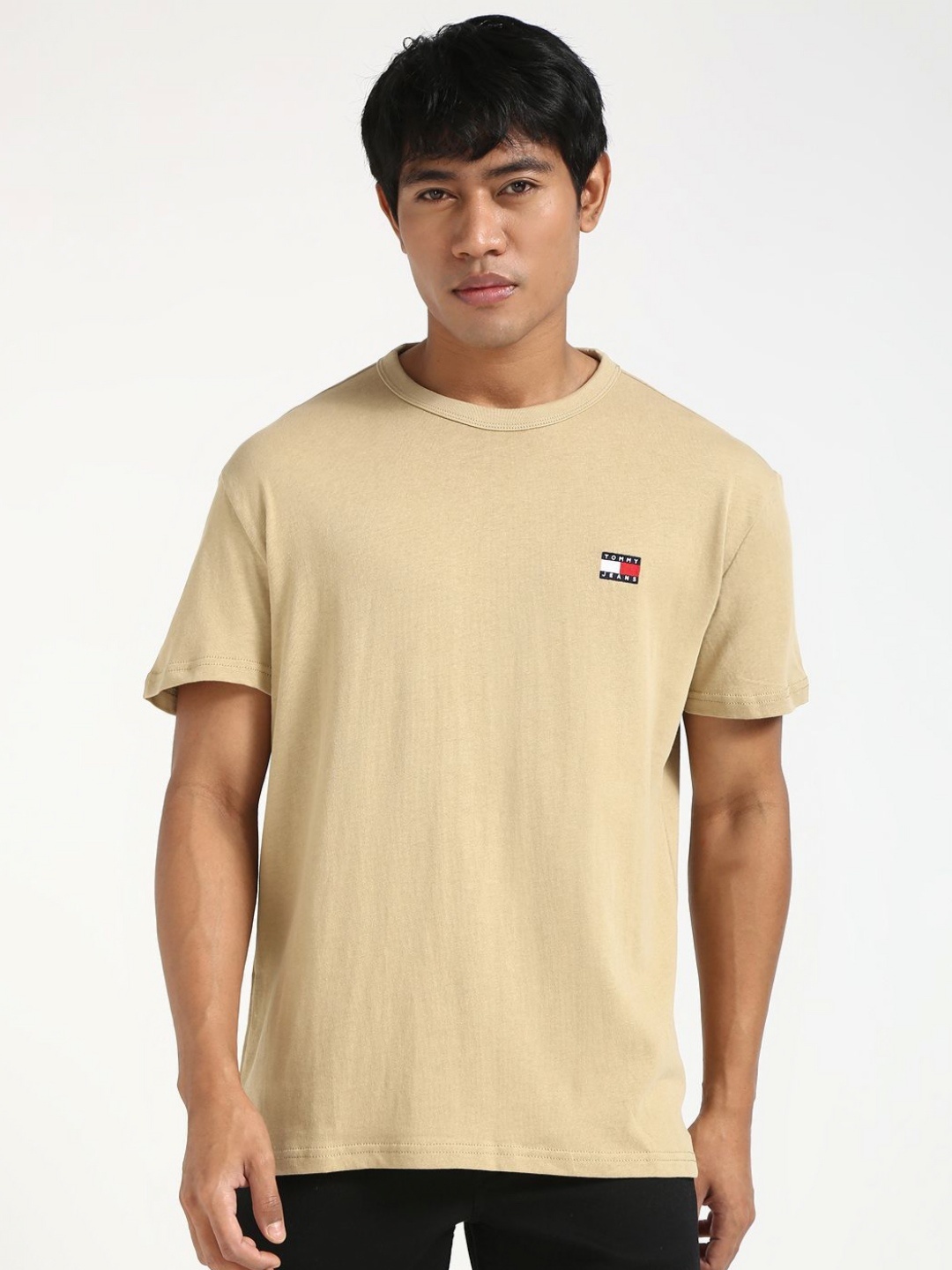 

Tommy Hilfiger Men BADGE Solid Round Neck Cotton T-shirt, Beige