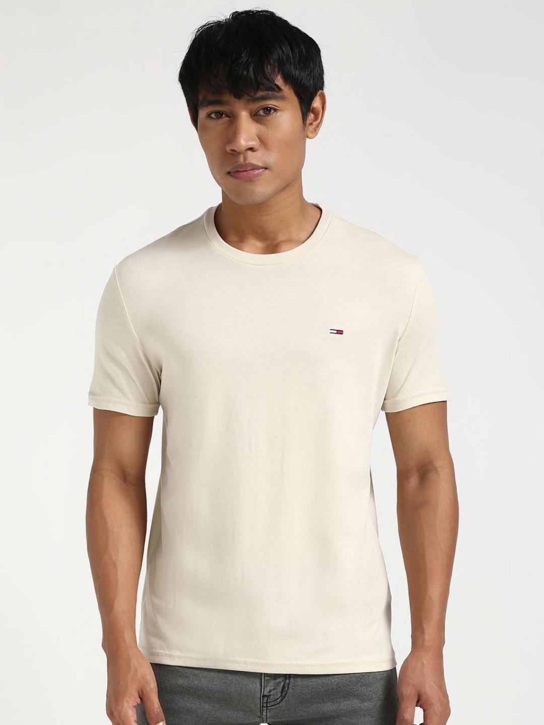 

Tommy Hilfiger Men Solid Round Neck Slim Fit Cotton T-shirt, Cream