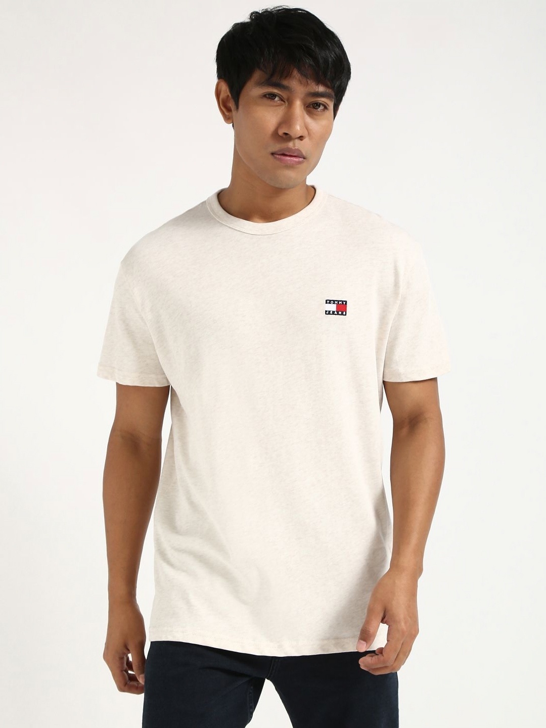 

Tommy Hilfiger Men Solid Round Neck Pure Cotton T-shirt, Off white