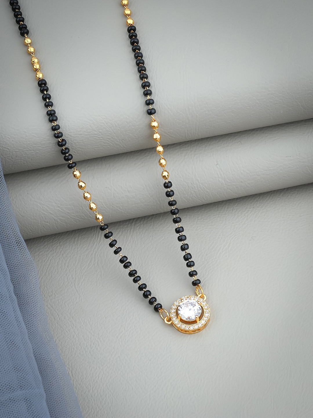 

Wynona Gold-Plated American Diamond Stone Studded & Beaded Mangalsutra