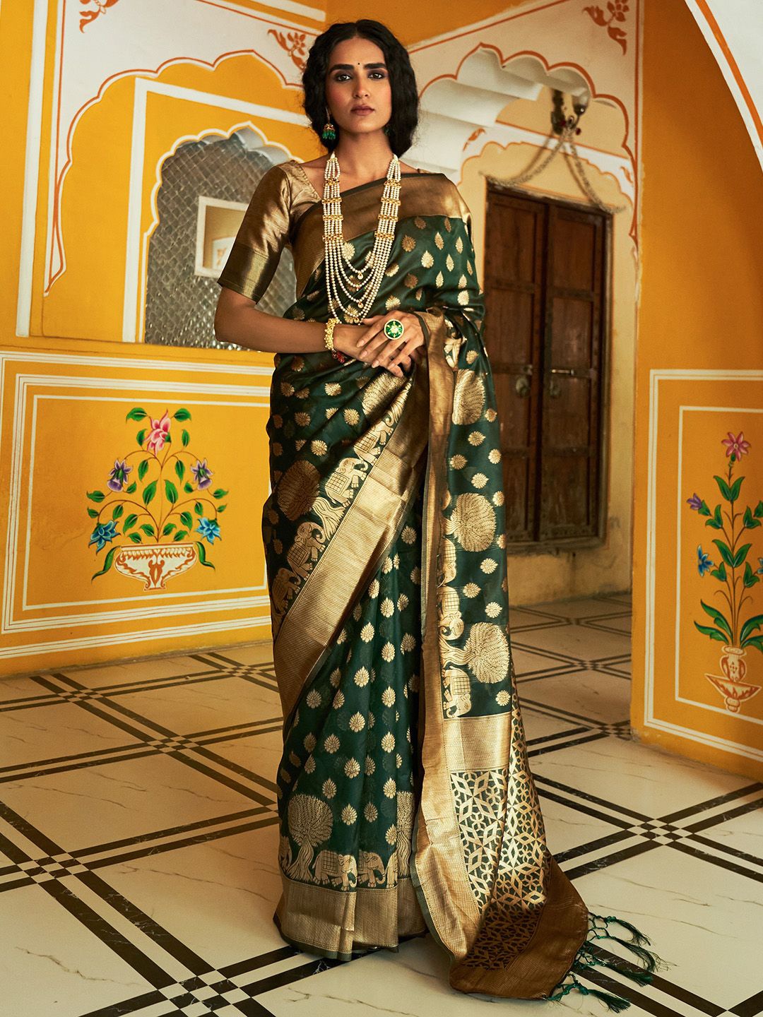 

KALINI Dark Green Organza Ethnic Motifs Saree with Unstitched Blouse Piece