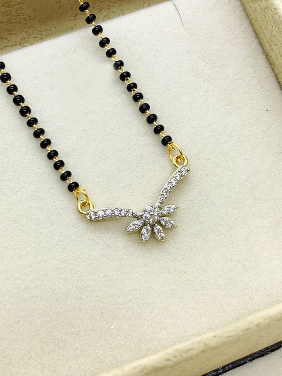 

Wynona Gold Plated American Diamond & Artificial Beads Studded Mangalsutra