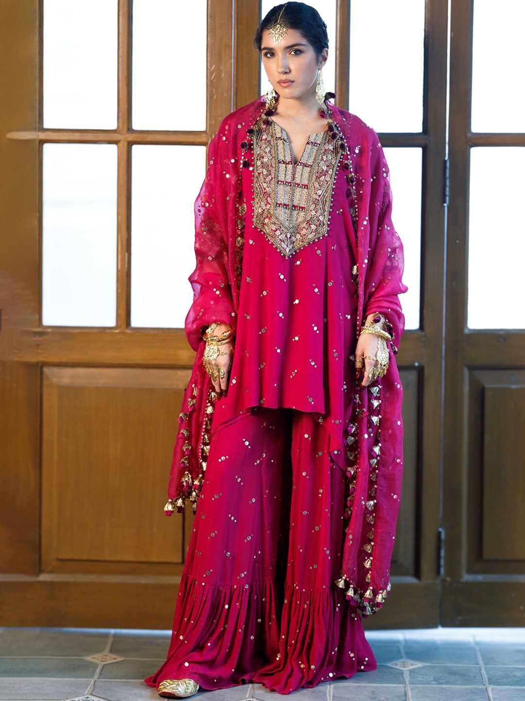 

Payal Singhal Women Ethnic Motifs Embroidered Regular Beads and Stones Kurti with Sharara & With Dupatta, Pink