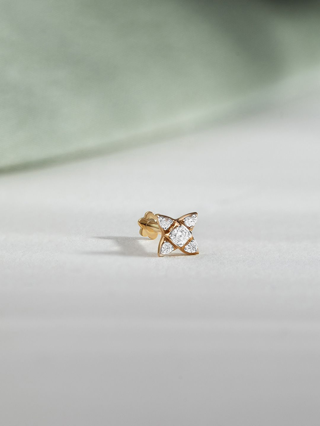 

Mia by Tanishq 14KT Nose Pin Diamond - 0.3 g, Yellow