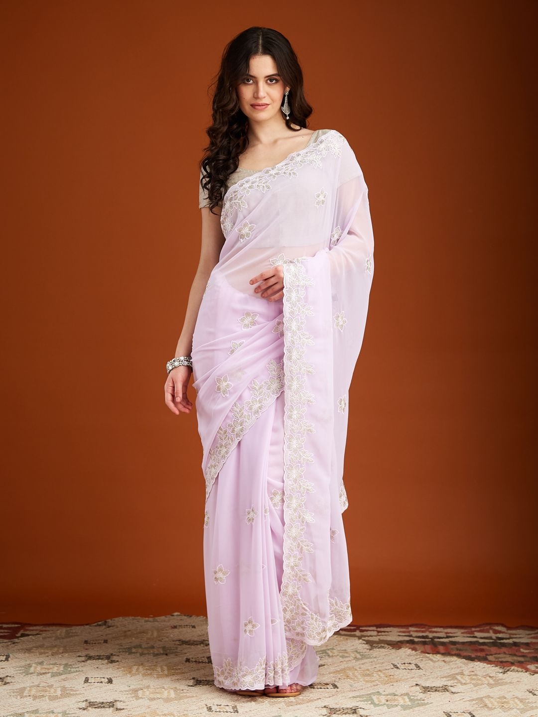

MAHALASA Women Ethnic Motifs Embroidered Pure Georgette Saree, Purple