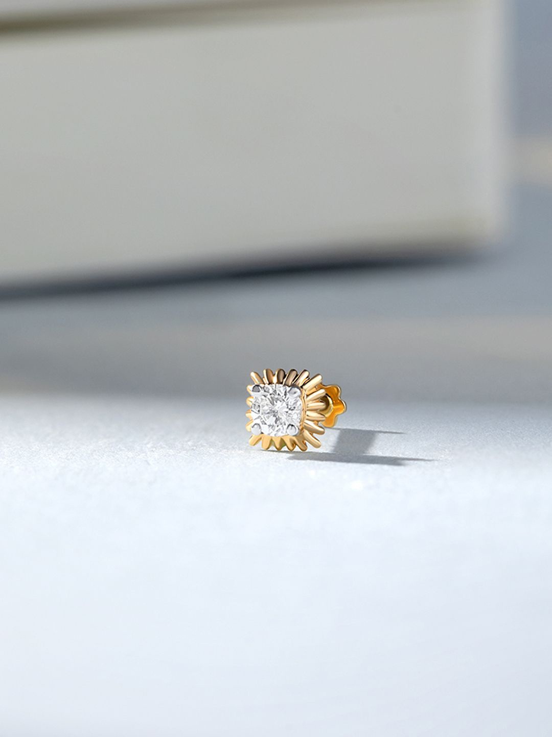 

Mia by Tanishq 14KT Nose Pin Diamond - 0.37 g, Yellow