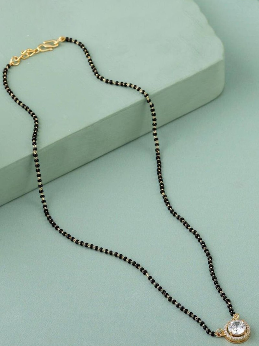 

Wynona Tanmaniya Pack Of 2 Gold-Plated Artificial Beads Mangalsutra