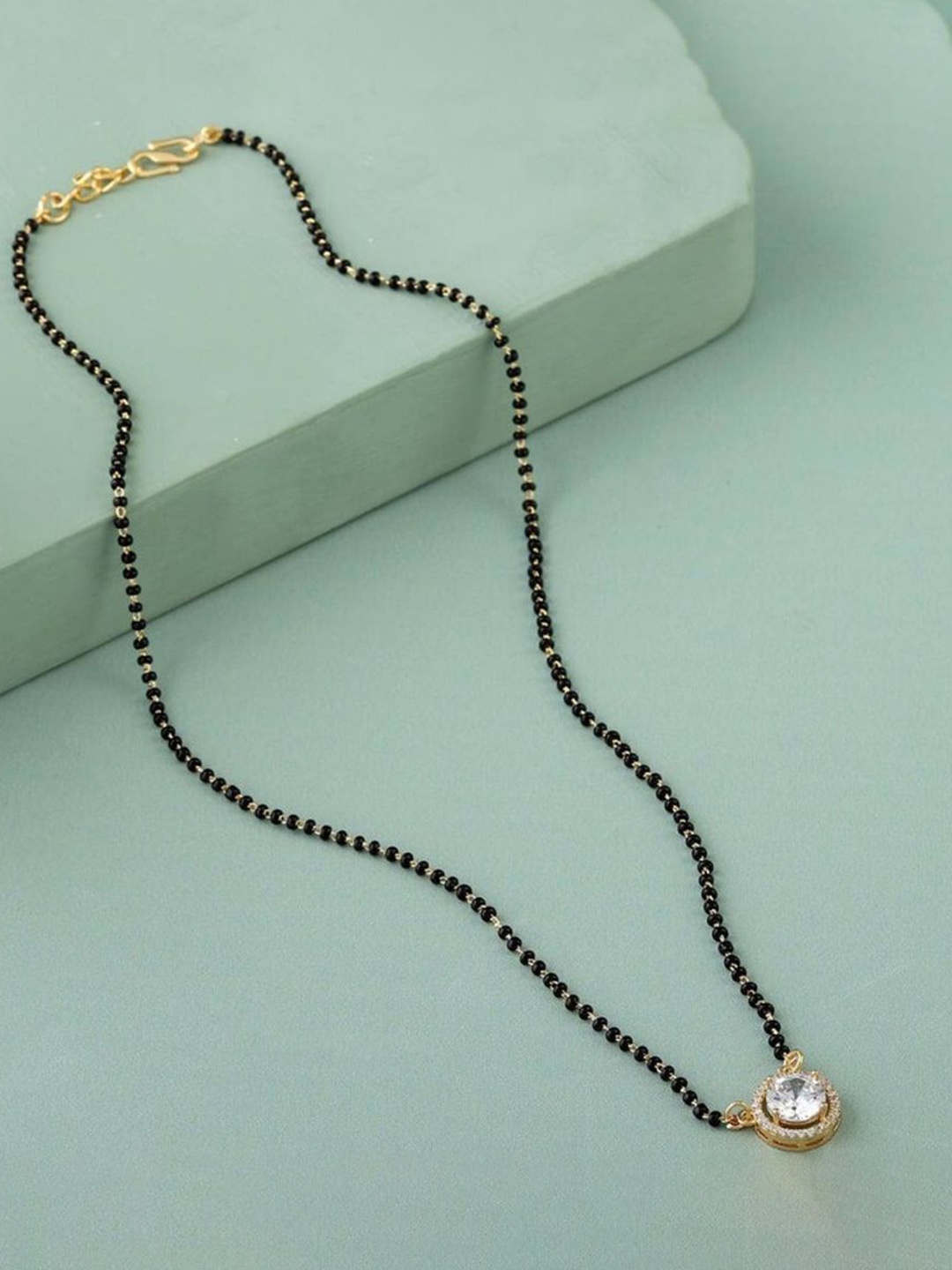 

Wynona Tanmaniya Pack Of 2 Gold-Plated Artificial Beads Mangalsutra