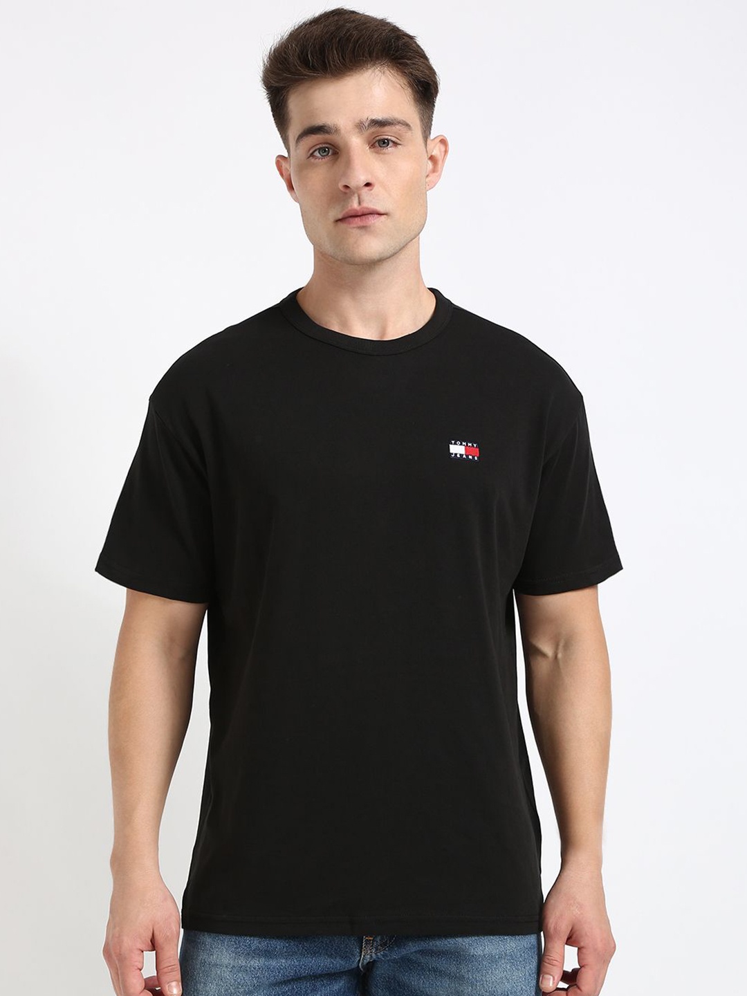 

Tommy Hilfiger Men Solid Round Neck Cotton Relaxed Fit T-shirt, Black