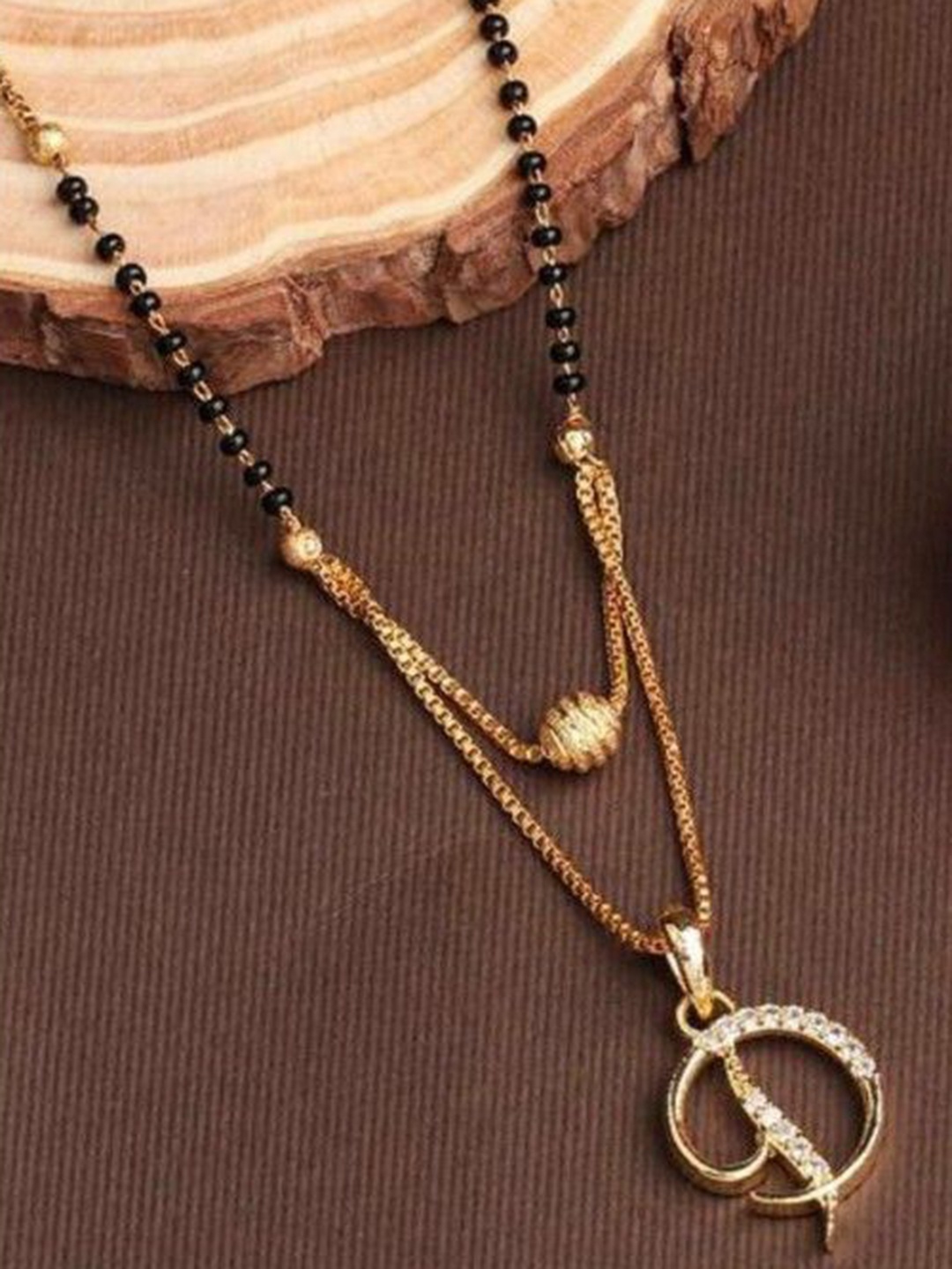 

Wynona Gold Plated Artificial Stones & Beads Studded Mangalsutra